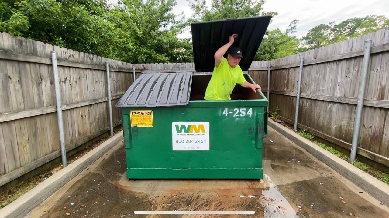 cleaning dumpster pads, pressure washing dumpster pads, business clean, business power washing